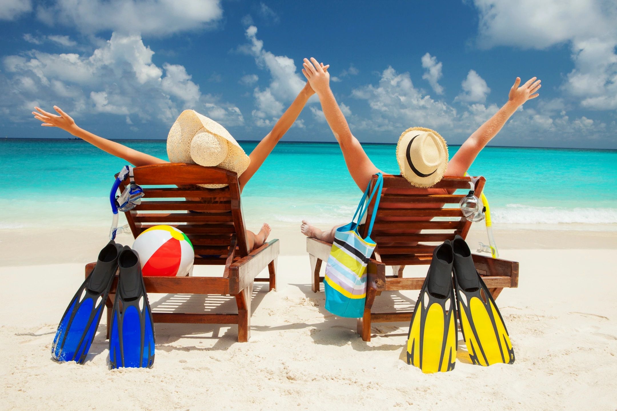 Beach loungers vacation celebration